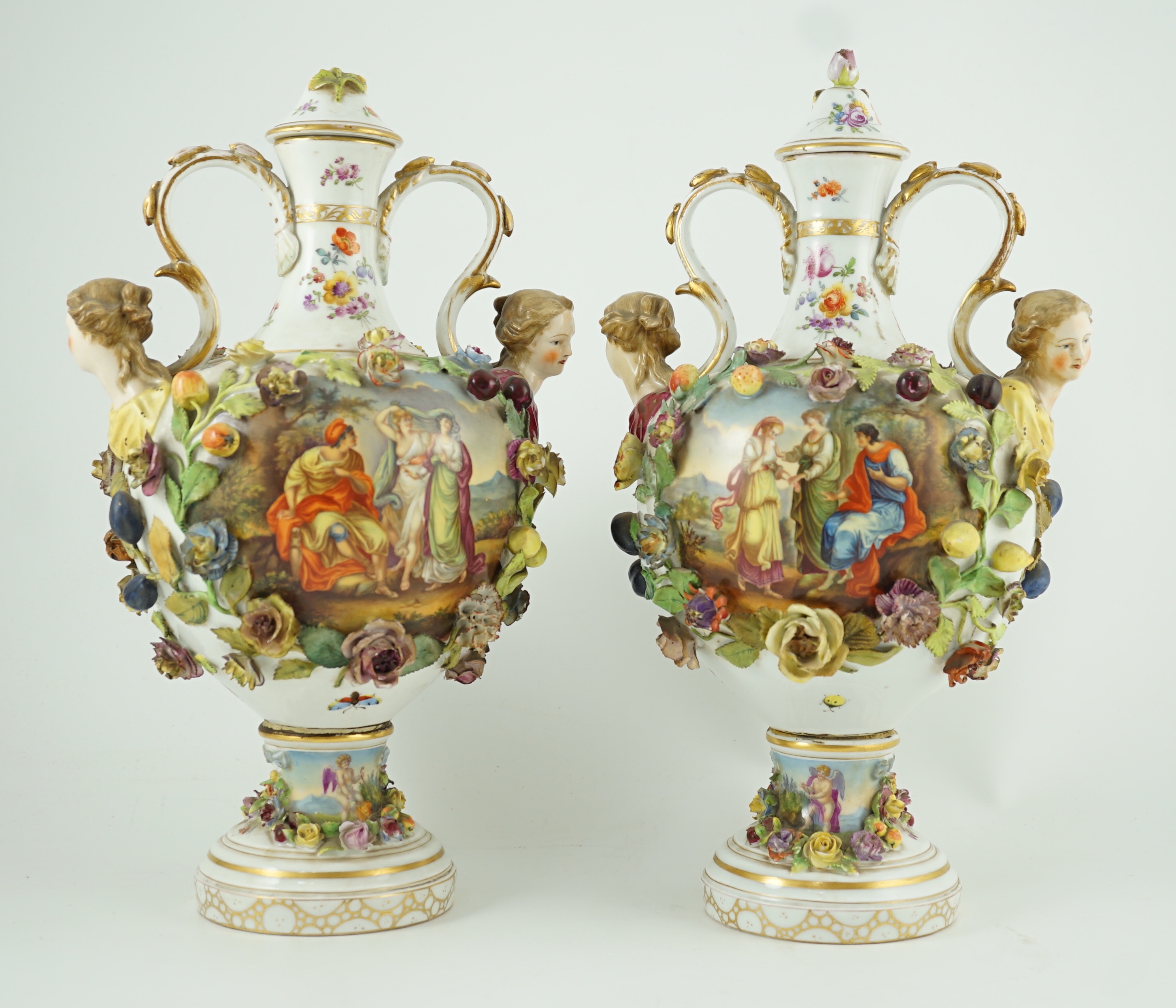 A pair of Potschappel porcelain vases and cover, late 19th century, 41cm high, slight damage